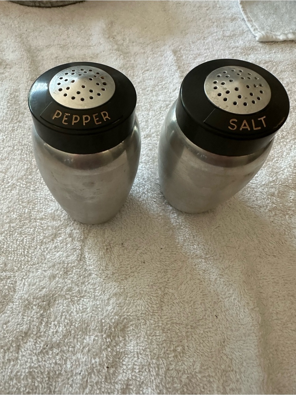 Salt and Pepper spun aluminum Shakers with Black Lids vintage Kromex